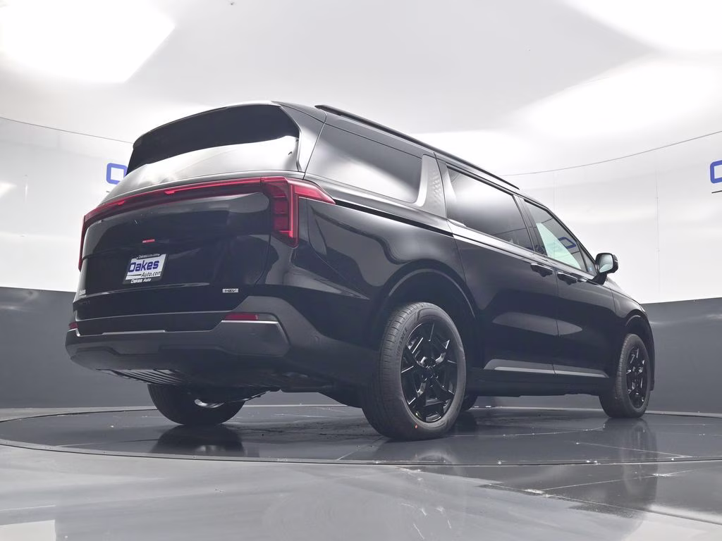 2026 Aurora Black Pearl Kia Carnival Hybrid SX FWD Van