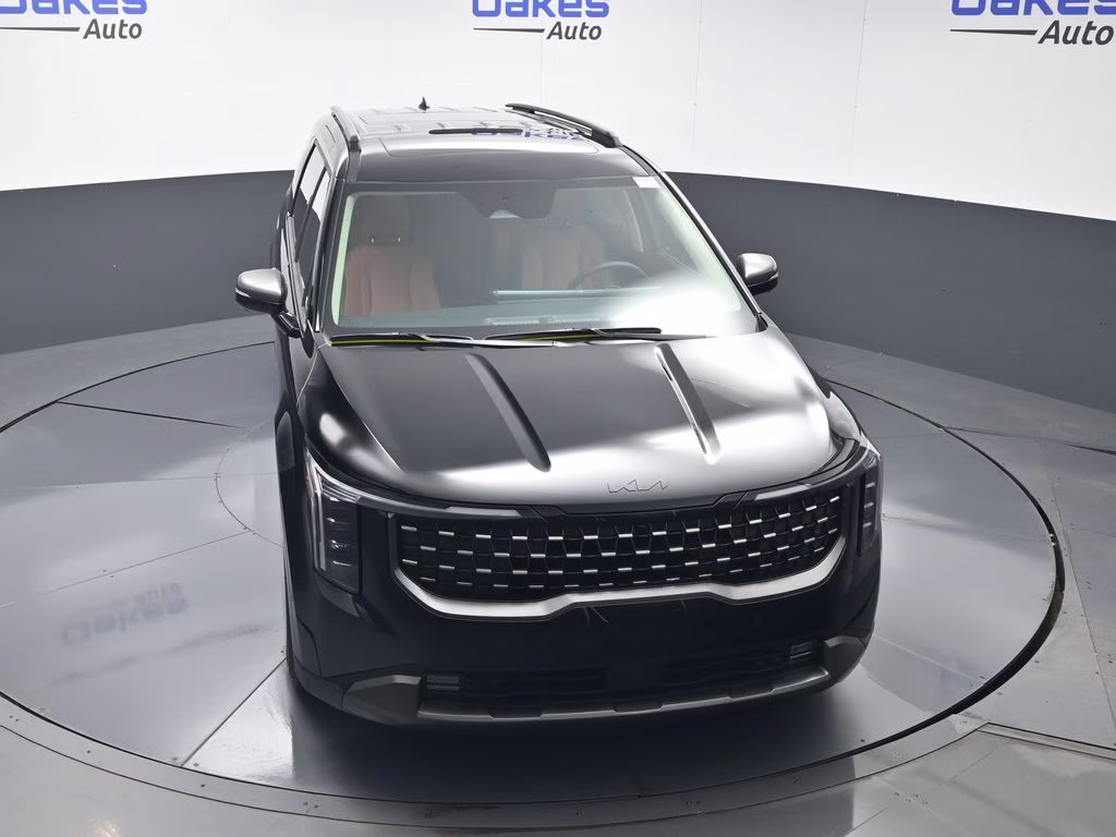 2026 Aurora Black Pearl Kia Carnival Hybrid SX FWD Van