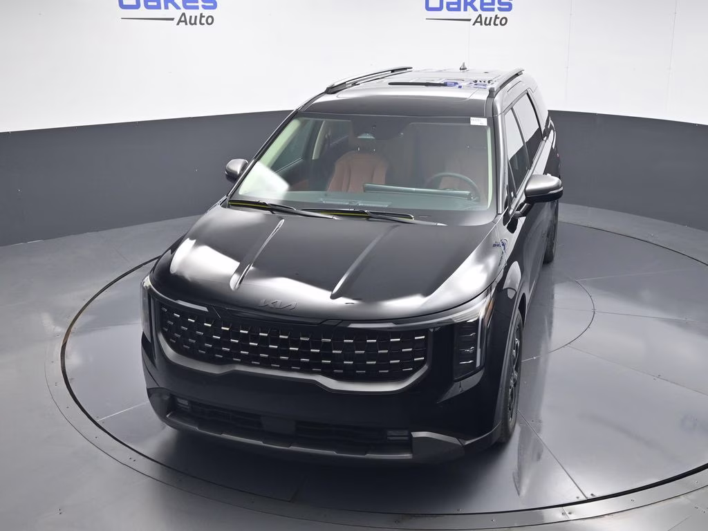 2026 Aurora Black Pearl Kia Carnival Hybrid SX FWD Van