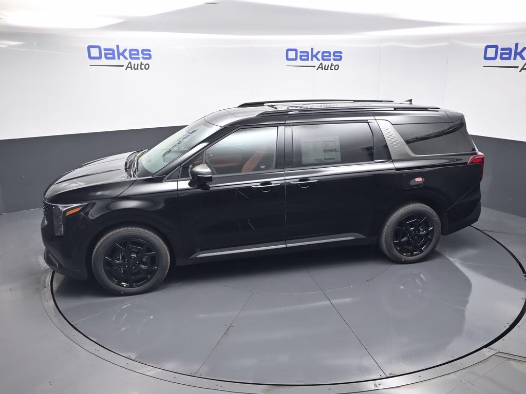 2026 Aurora Black Pearl Kia Carnival Hybrid SX FWD Van