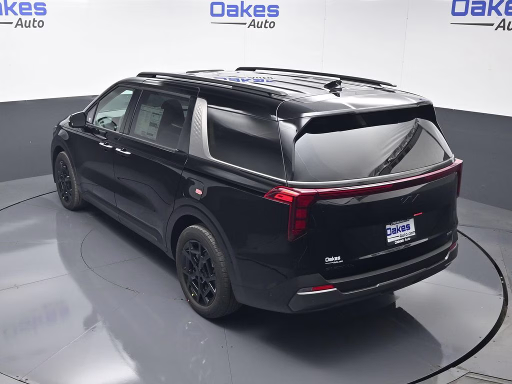 2026 Aurora Black Pearl Kia Carnival Hybrid SX FWD Van