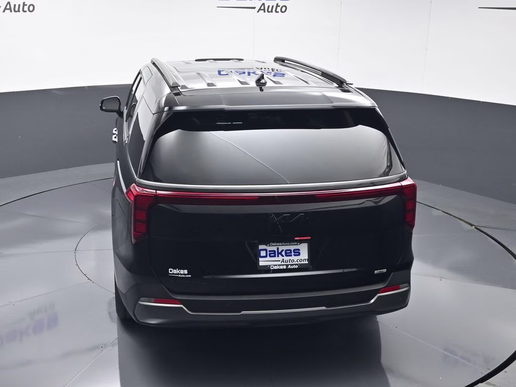 2026 Aurora Black Pearl Kia Carnival Hybrid SX FWD Van