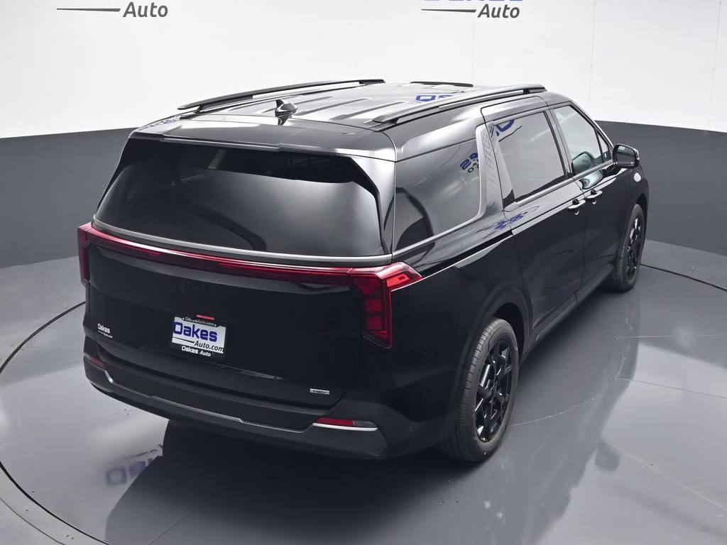 2026 Aurora Black Pearl Kia Carnival Hybrid SX FWD Van