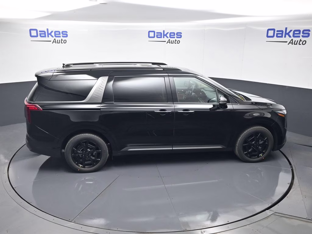 2026 Aurora Black Pearl Kia Carnival Hybrid SX FWD Van