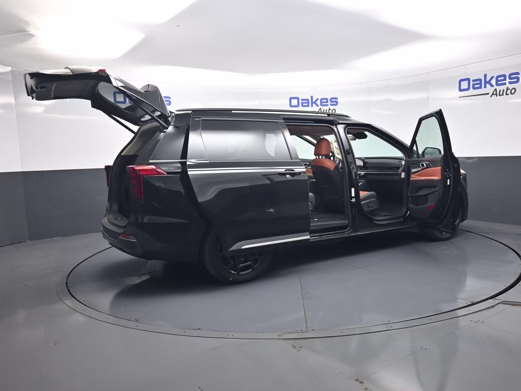 2026 Aurora Black Pearl Kia Carnival Hybrid SX FWD Van