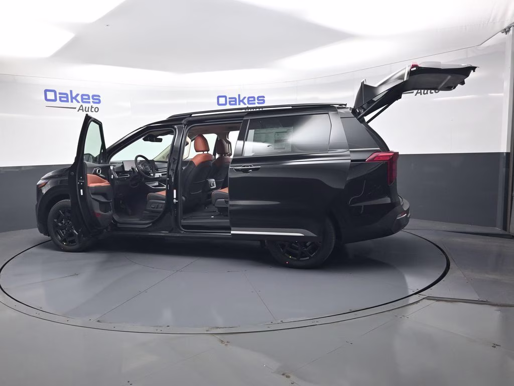 2026 Aurora Black Pearl Kia Carnival Hybrid SX FWD Van