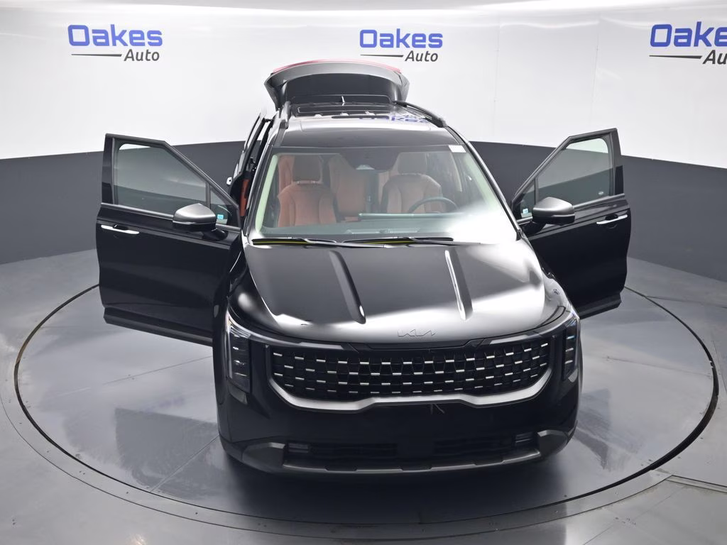 2026 Aurora Black Pearl Kia Carnival Hybrid SX FWD Van