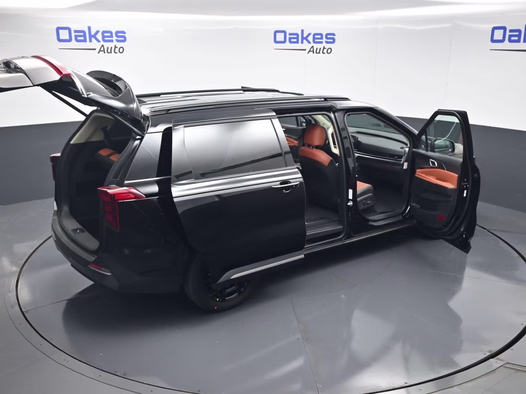 2026 Aurora Black Pearl Kia Carnival Hybrid SX FWD Van