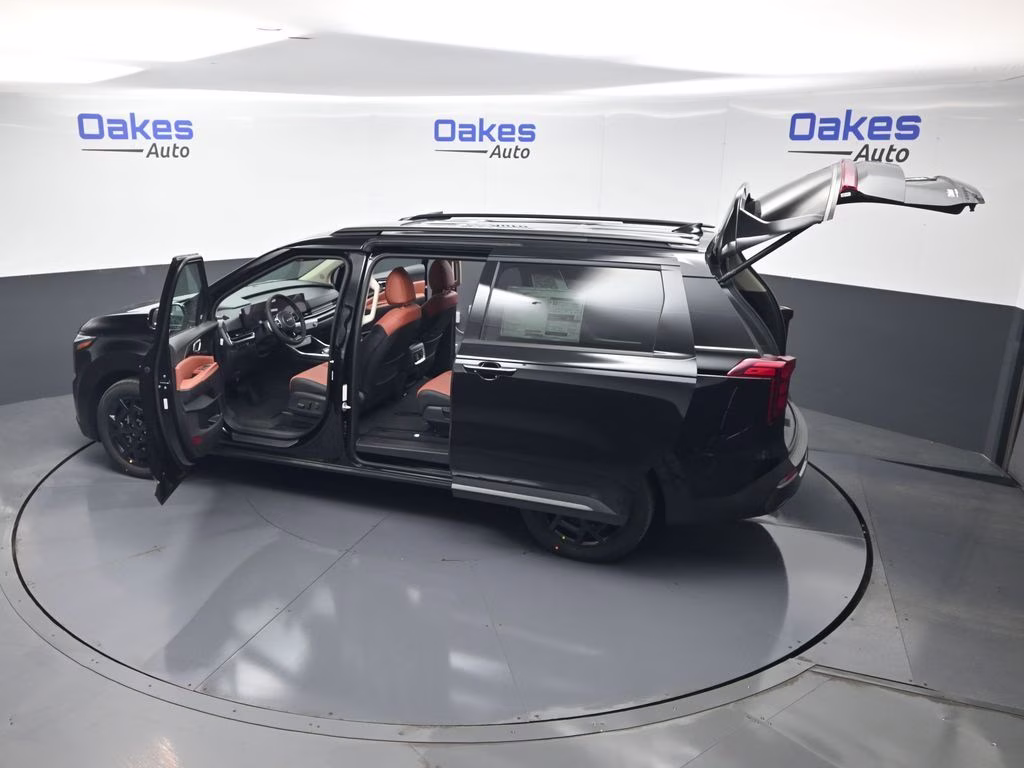 2026 Aurora Black Pearl Kia Carnival Hybrid SX FWD Van