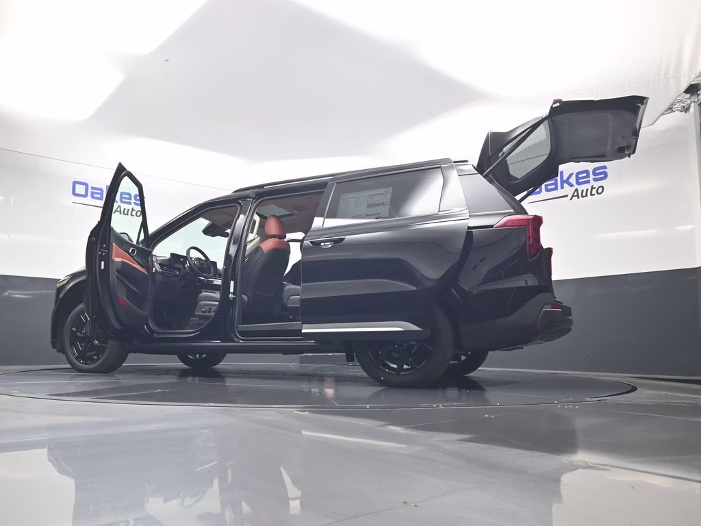 2026 Aurora Black Pearl Kia Carnival Hybrid SX FWD Van