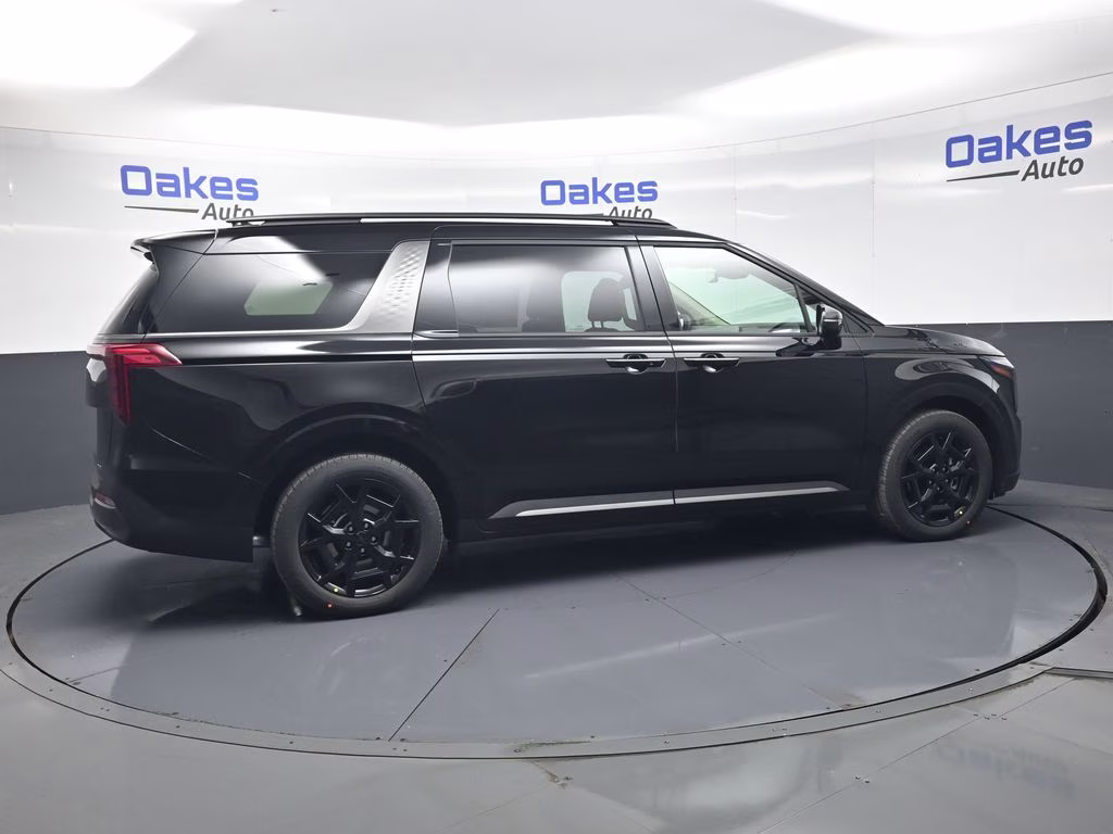 2026 Aurora Black Pearl Kia Carnival Hybrid SX FWD Van