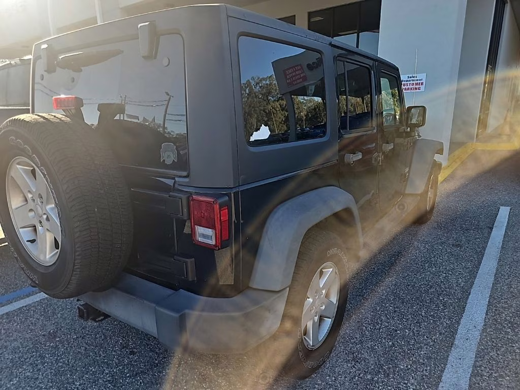 2016 Black Clearcoat Jeep Wrangler Unlimited Sport 4X4 SUV