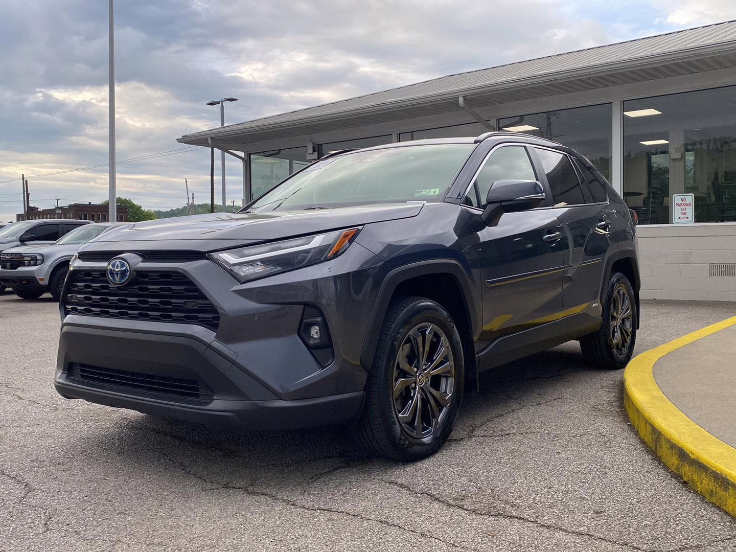 2023 Magnetic Gray Metallic Toyota RAV4 Hybrid XLE Premium AWD SUV