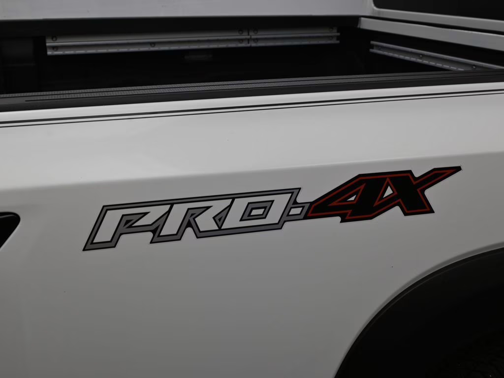 2023 Glacier White Nissan Frontier PRO-4X 4X4 Truck