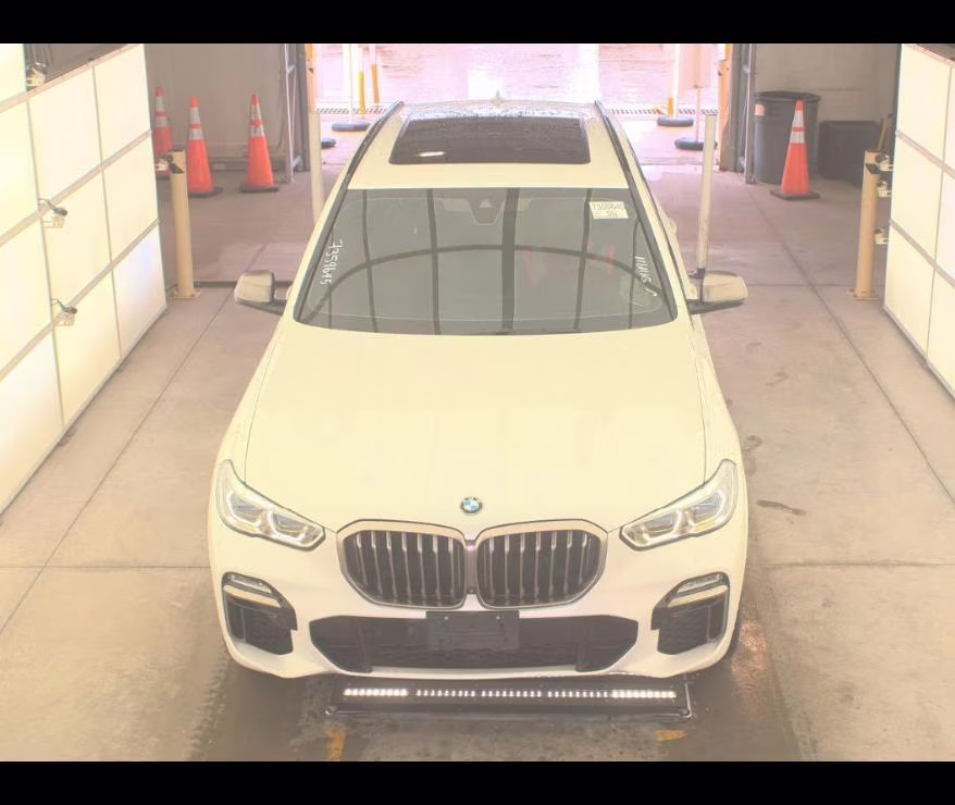 2020 Mineral White Metallic BMW X5 M50i AWD Sports Activity Vehicle