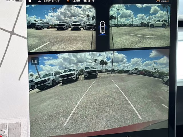 2025 Ultra Red Tesla Model Y Long Range AWD SUV