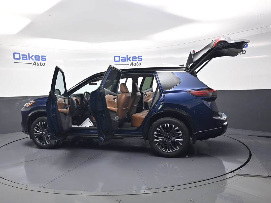 2024 Deep Ocean Blue Pearl/Super Black Nissan Rogue Platinum AWD SUV