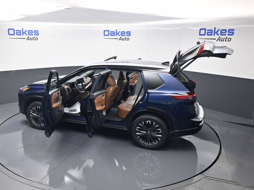 2024 Deep Ocean Blue Pearl/Super Black Nissan Rogue Platinum AWD SUV