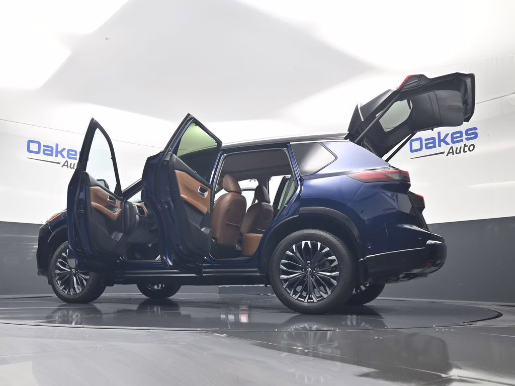 2024 Deep Ocean Blue Pearl/Super Black Nissan Rogue Platinum AWD SUV