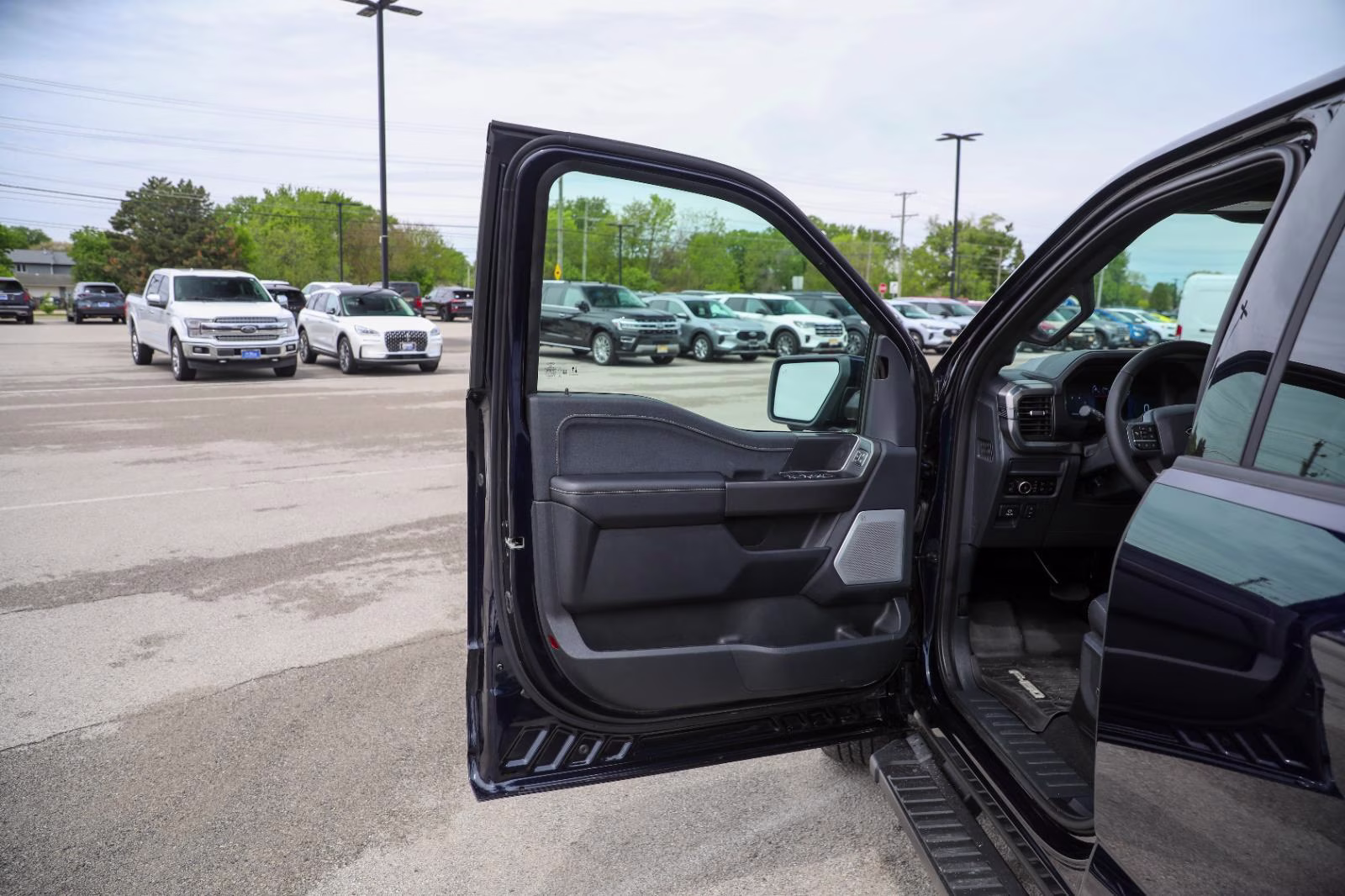 2025 Antimatter Blue Ford F-150 LARIAT 4X4 Truck
