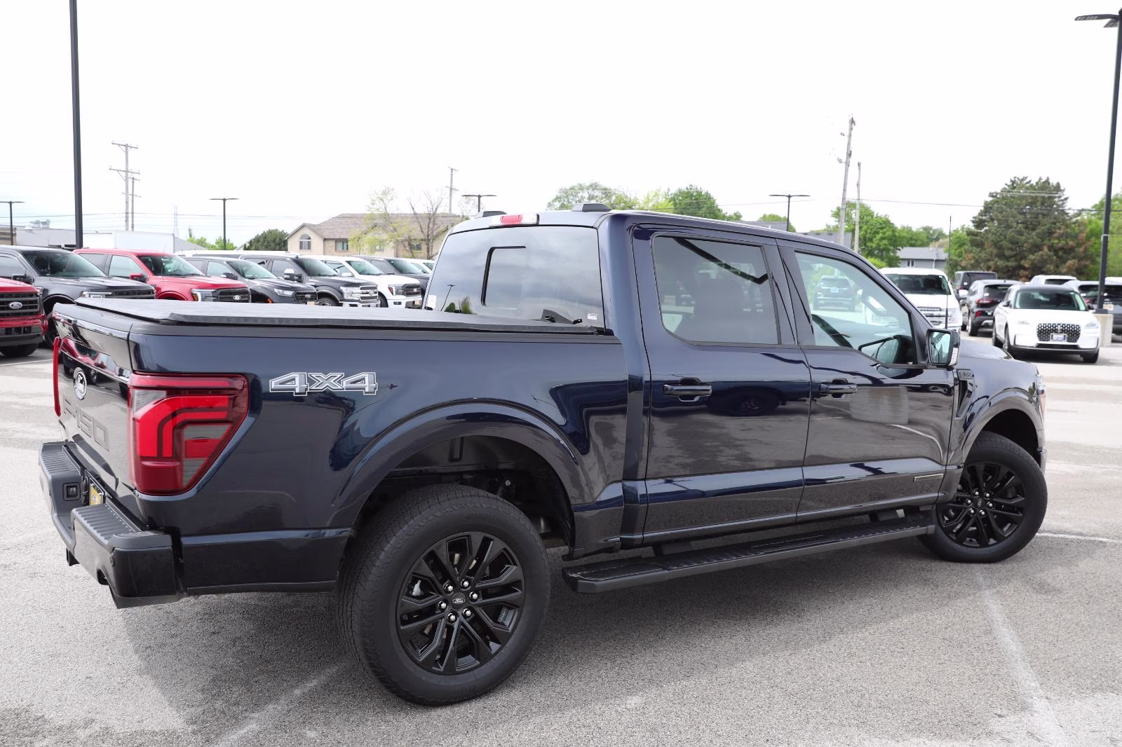 2025 Antimatter Blue Ford F-150 LARIAT 4X4 Truck