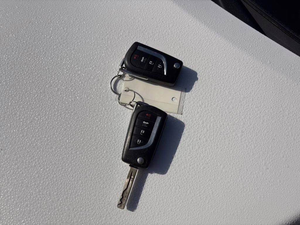 2018 Super White Toyota Camry LE FWD Sedan