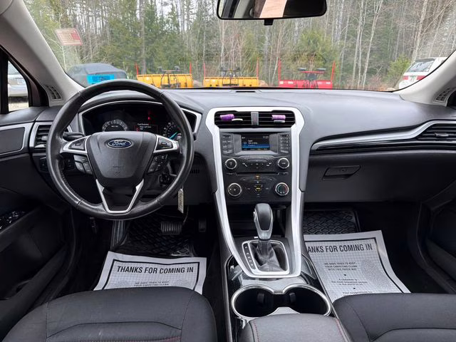 2014 Ruby Red Metallic Ford Fusion SE FWD Sedan