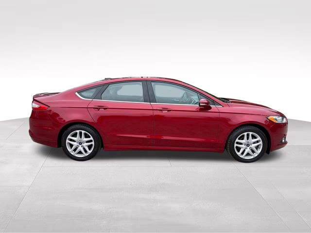 2014 Ruby Red Metallic Ford Fusion SE FWD Sedan