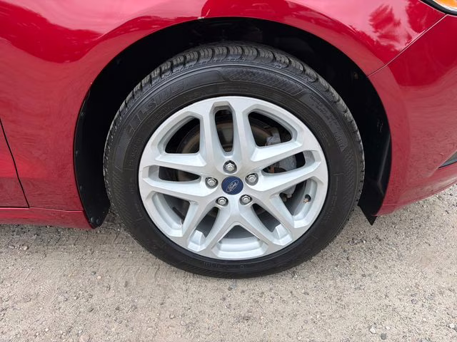 2014 Ruby Red Metallic Ford Fusion SE FWD Sedan