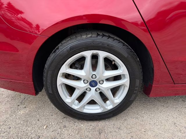 2014 Ruby Red Metallic Ford Fusion SE FWD Sedan