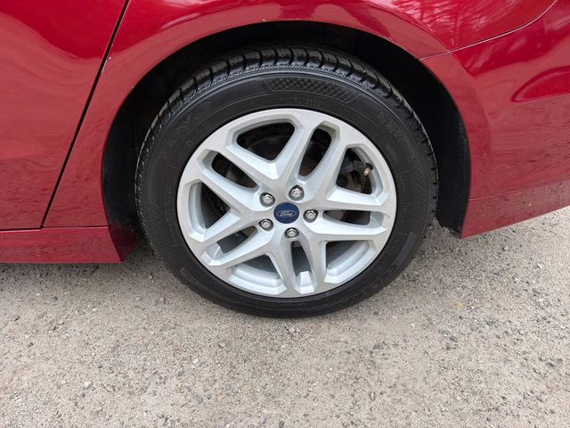 2014 Ruby Red Metallic Ford Fusion SE FWD Sedan