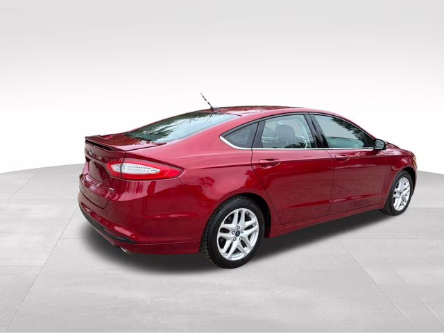 2014 Ruby Red Metallic Ford Fusion SE FWD Sedan