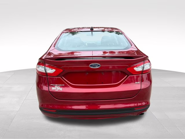 2014 Ruby Red Metallic Ford Fusion SE FWD Sedan