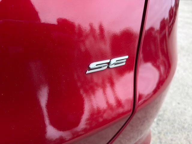 2014 Ruby Red Metallic Ford Fusion SE FWD Sedan