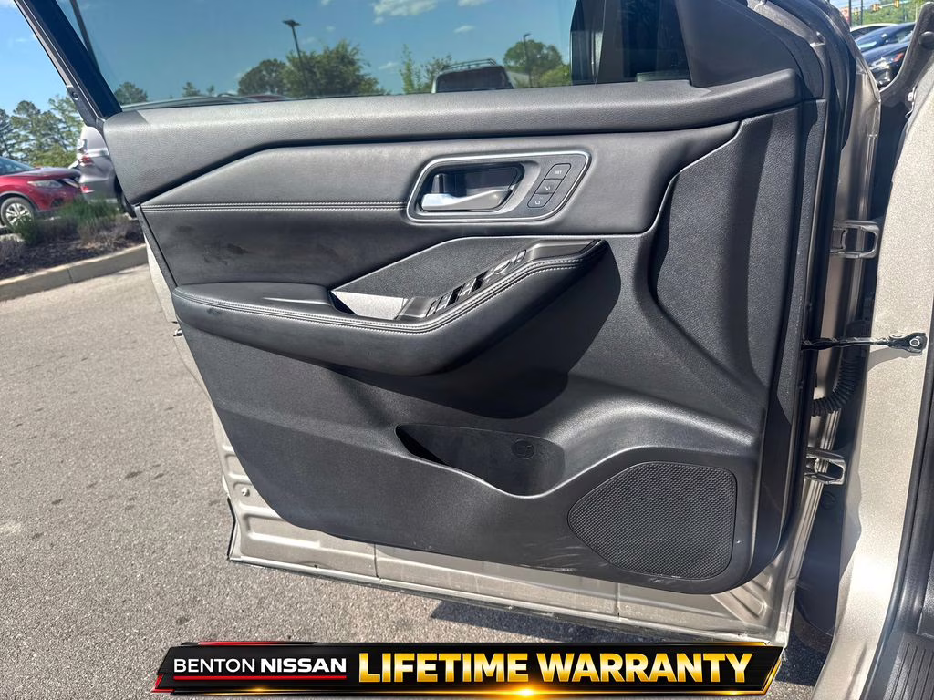 2025 Champagne Silver Metallic/Super Black Nissan Rogue Platinum FWD SUV