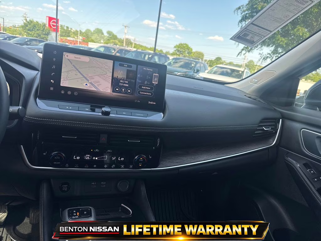 2025 Champagne Silver Metallic/Super Black Nissan Rogue Platinum FWD SUV