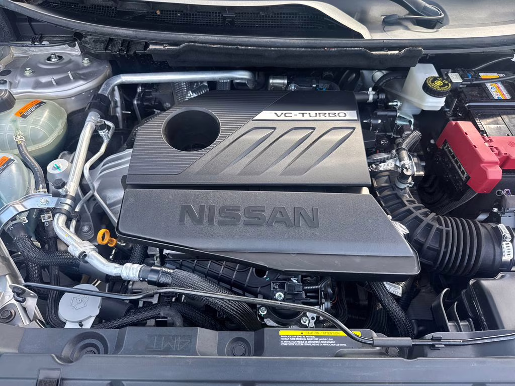 2025 Champagne Silver Metallic/Super Black Nissan Rogue Platinum FWD SUV