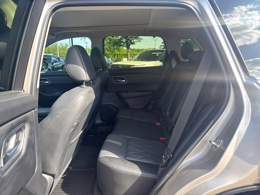 2025 Champagne Silver Metallic/Super Black Nissan Rogue Platinum FWD SUV