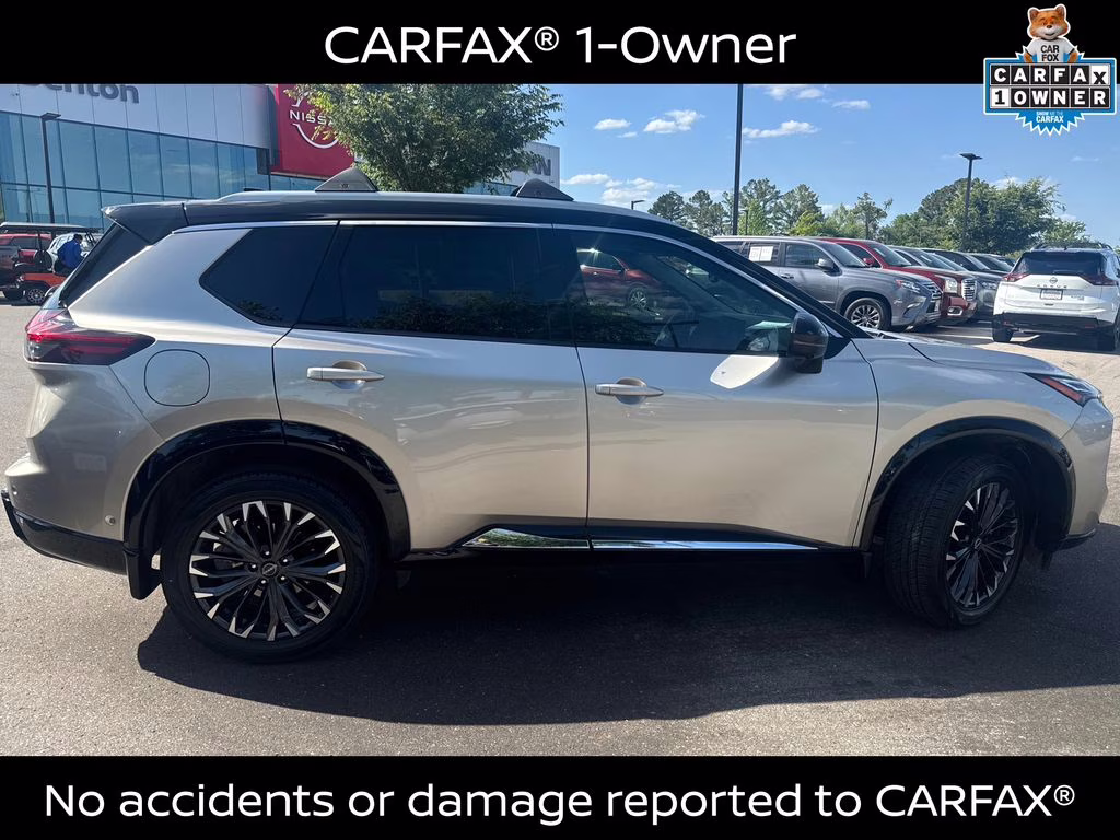 2025 Champagne Silver Metallic/Super Black Nissan Rogue Platinum FWD SUV