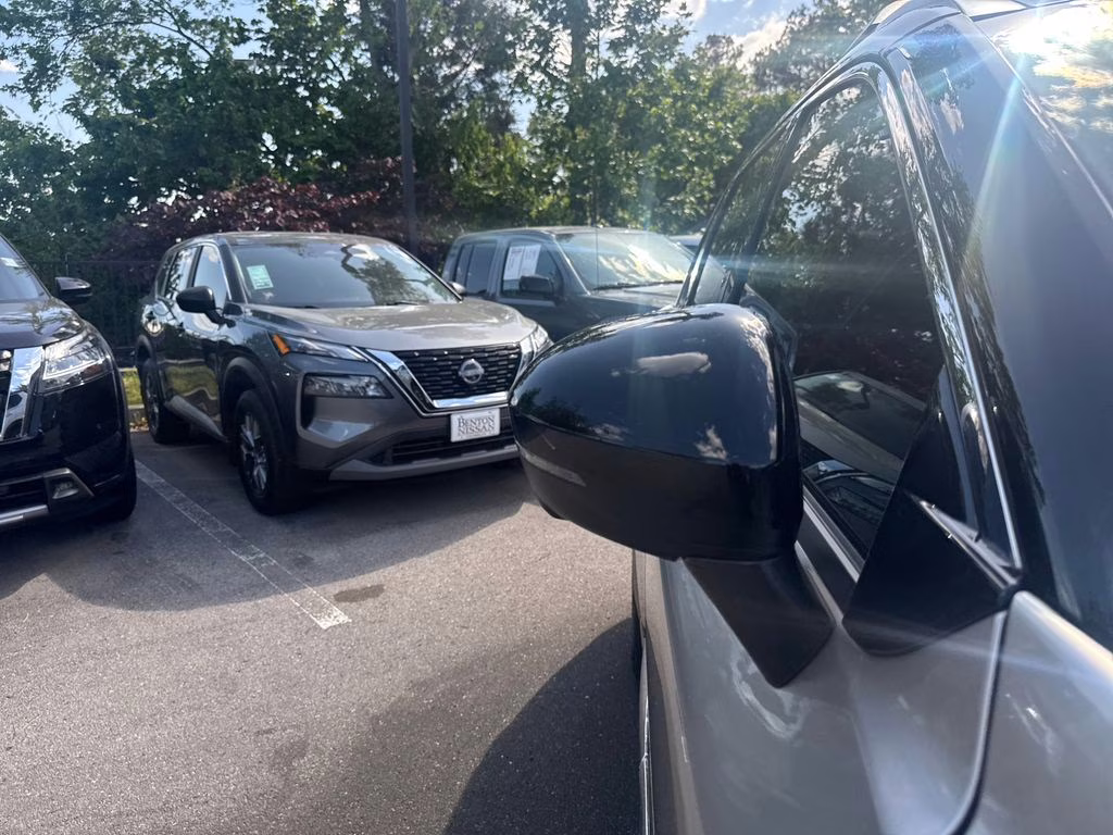 2025 Champagne Silver Metallic/Super Black Nissan Rogue Platinum FWD SUV