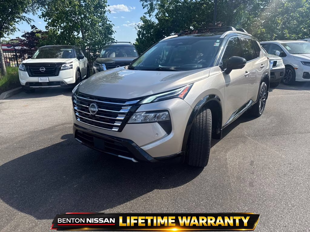2025 Champagne Silver Metallic/Super Black Nissan Rogue Platinum FWD SUV