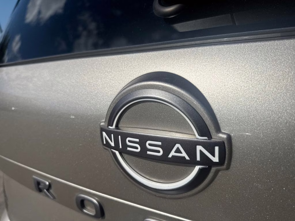 2025 Champagne Silver Metallic/Super Black Nissan Rogue Platinum FWD SUV