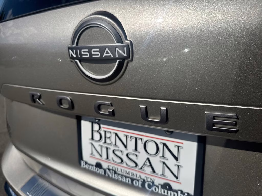 2025 Champagne Silver Metallic/Super Black Nissan Rogue Platinum FWD SUV