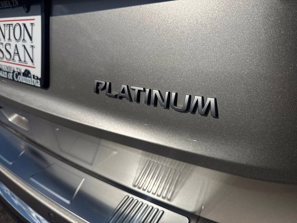 2025 Champagne Silver Metallic/Super Black Nissan Rogue Platinum FWD SUV
