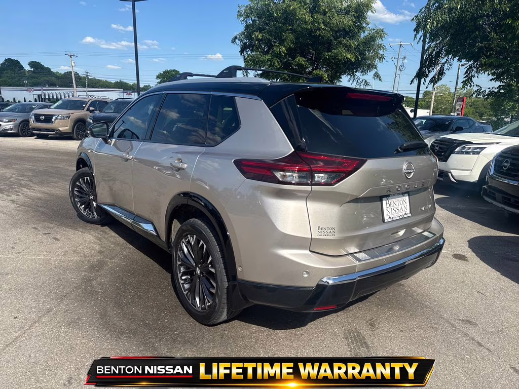 2025 Champagne Silver Metallic/Super Black Nissan Rogue Platinum FWD SUV