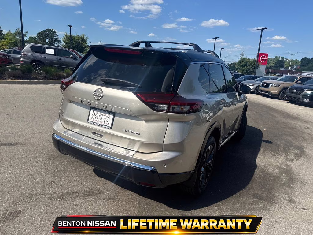 2025 Champagne Silver Metallic/Super Black Nissan Rogue Platinum FWD SUV