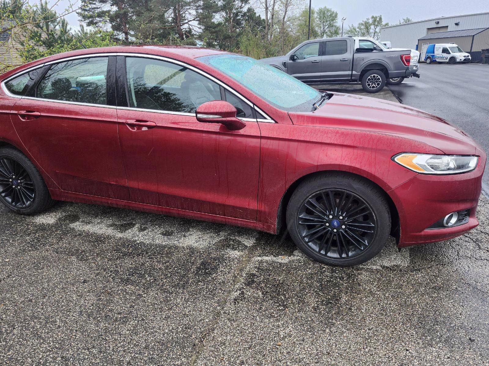 2016 Ruby Red Metallic Tinted Clearcoat Ford Fusion SE AWD Sedan