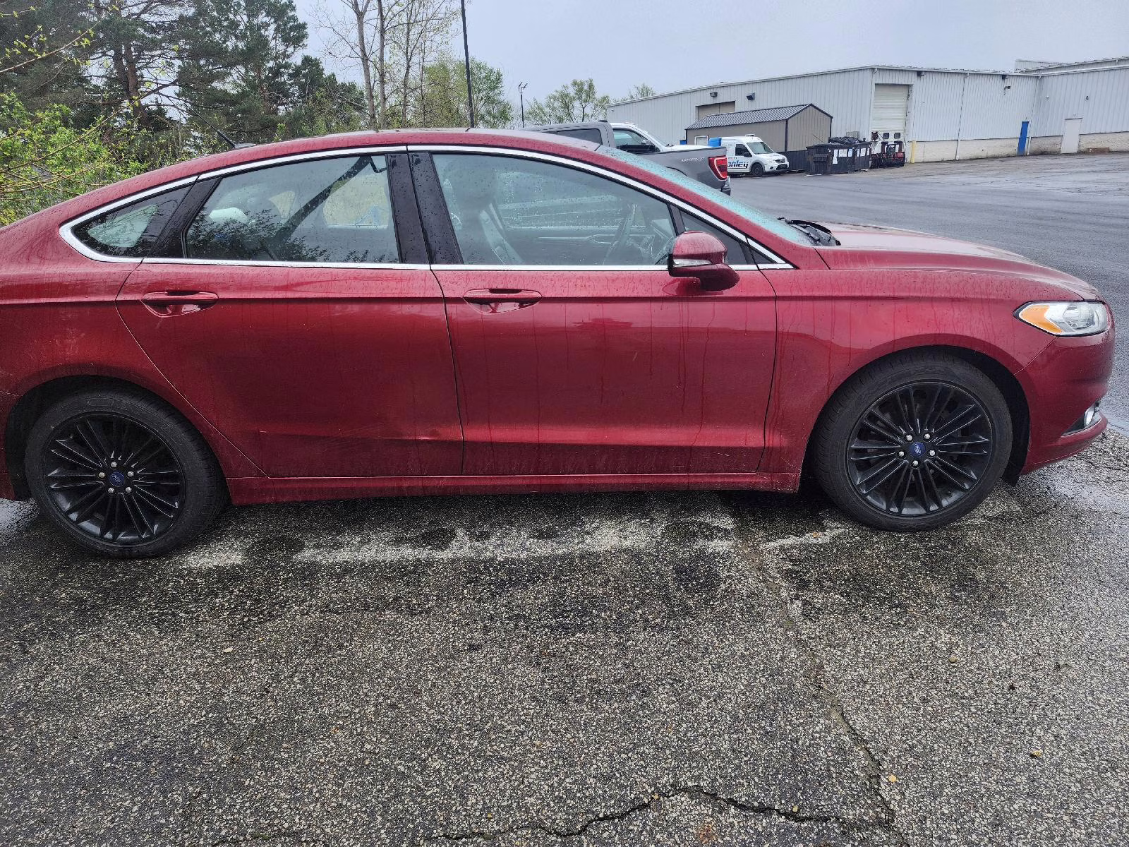 2016 Ruby Red Metallic Tinted Clearcoat Ford Fusion SE AWD Sedan