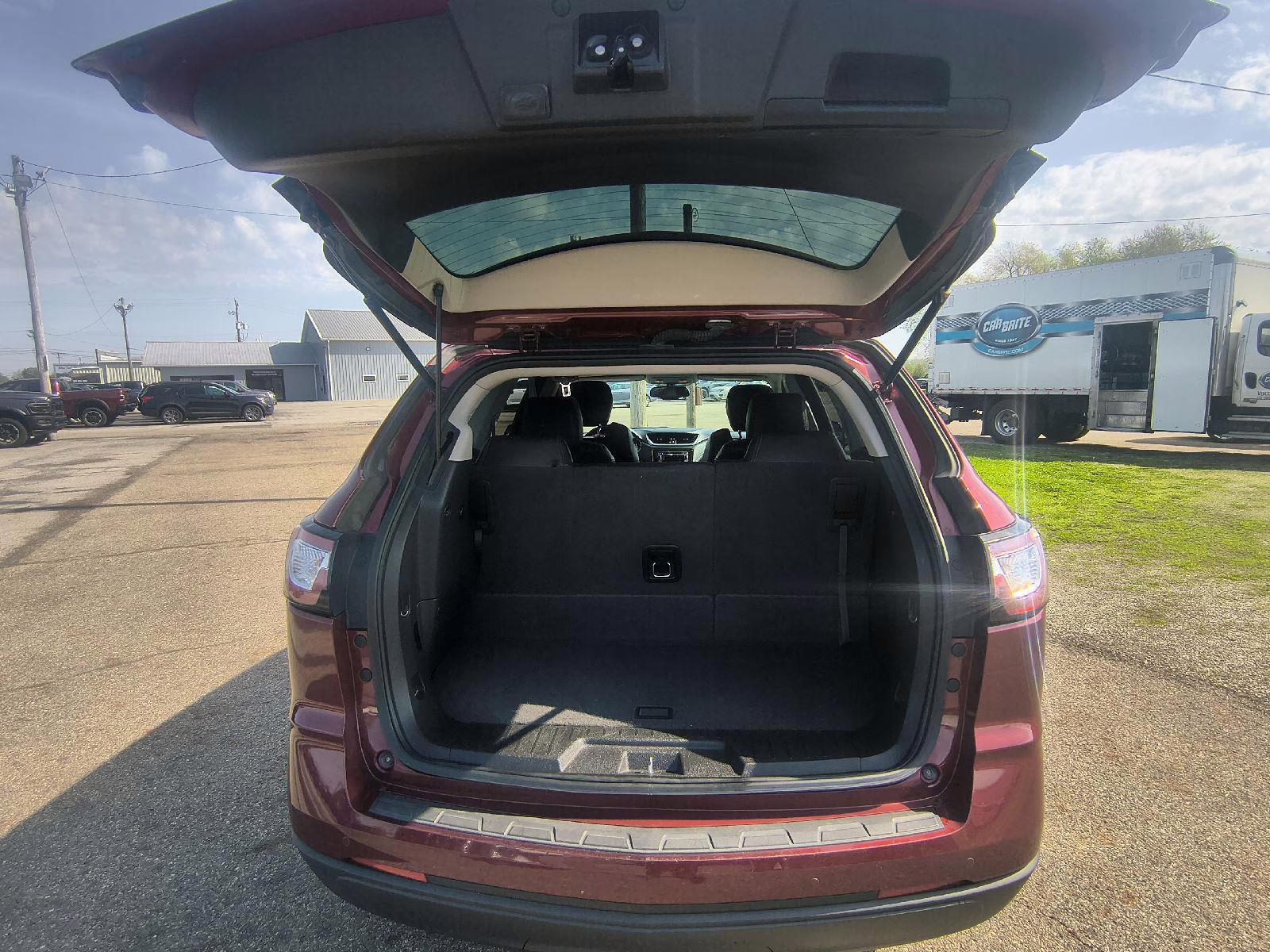 2015 Siren Red Tintcoat Chevrolet Traverse LT AWD SUV