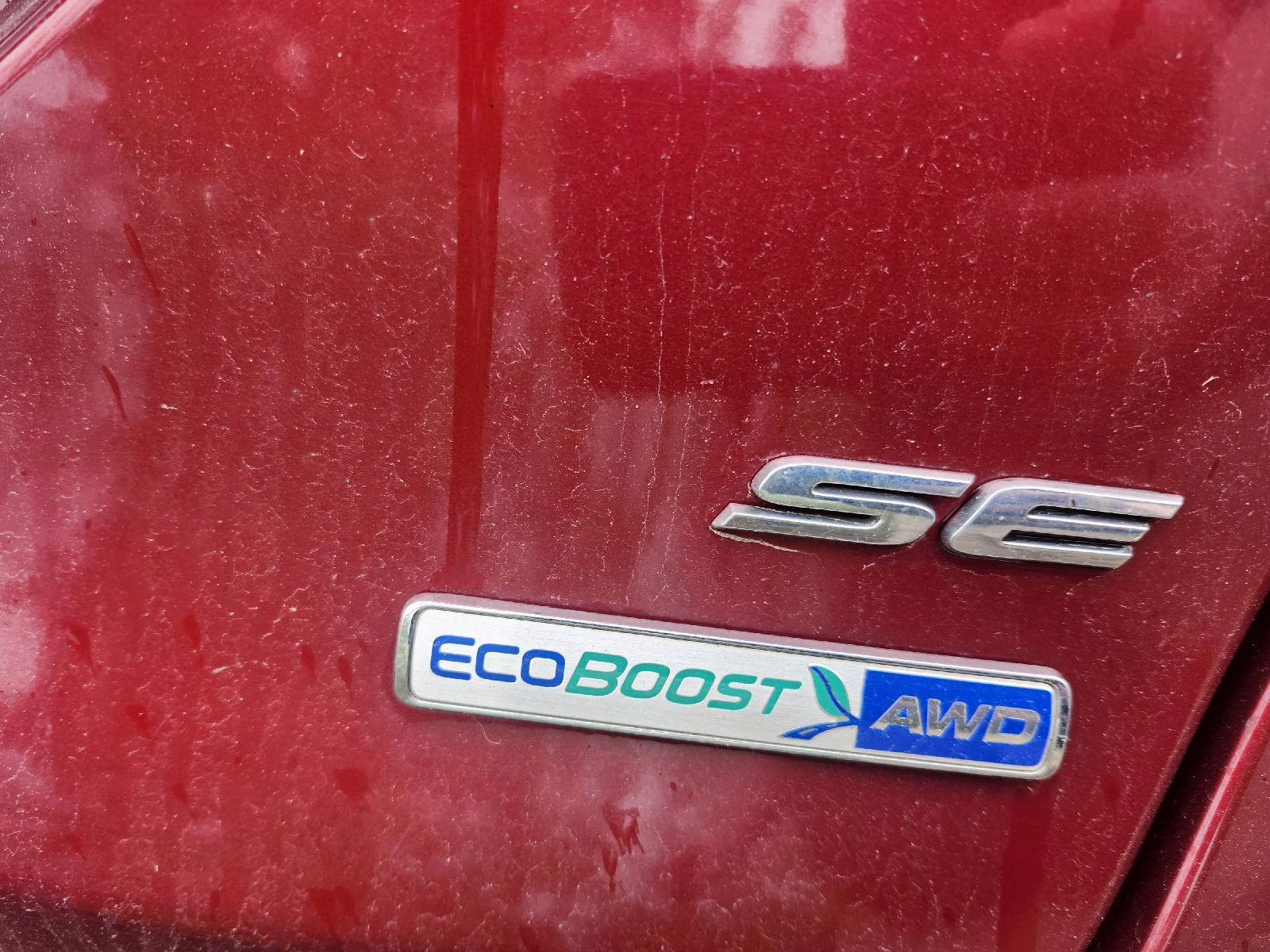 2016 Ruby Red Metallic Tinted Clearcoat Ford Fusion SE AWD Sedan